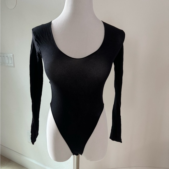 Assorted lingerie. One crotchless body stocking, one chemise, one body suit. - Picture 4 of 10